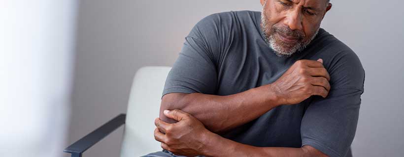 patient needing elbow pain in need of shockwave therapy in Newport Beach